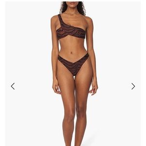 We wore what bathing suit top, asymmetrical bikini top